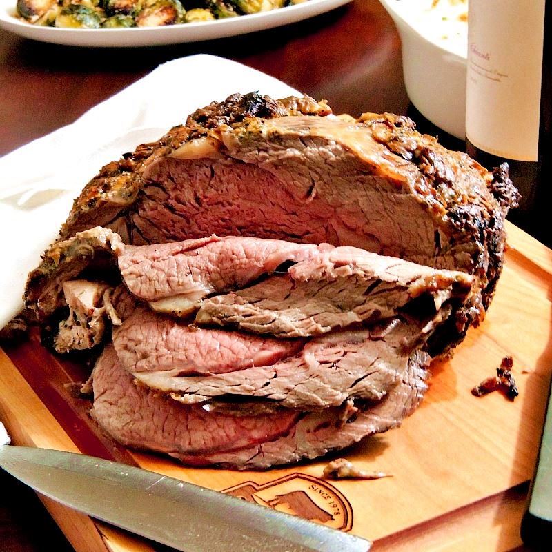 THE BEST BONELESS RIB ROAST WITH ROASTED GARLIC AND HERBS - Impress your family and friends with this amazing rib roast as the center of your holiday meal! From www.bobbiskozykitchen.com #beef #roast #roastperfect #bestangusbeef