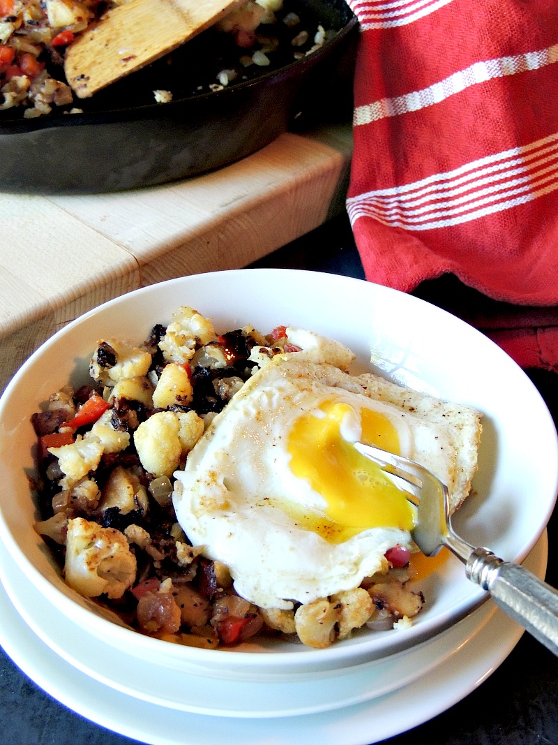 This Cauliflower Hash recipe is a delicious, low calorie, gluten-free, vegetarian or vegan, way to have that standard breakfast hash with zero guilt. #breakfast #cauliflower #potato #breakfast #glutenfree #vegetarian #vegan #recipe | bobbiskozykitchen.com