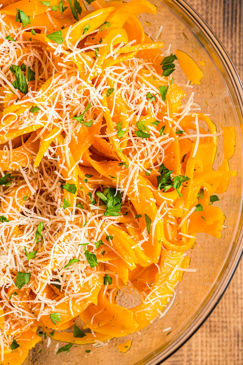 These roasted Butternut Squash Noodles are topped with a nutty browned butter, Parmesan cheese, and a sprinkling of fresh chopped parsley, for a delicious dish that cooks in 10 minutes, or less, and uses very few ingredients.