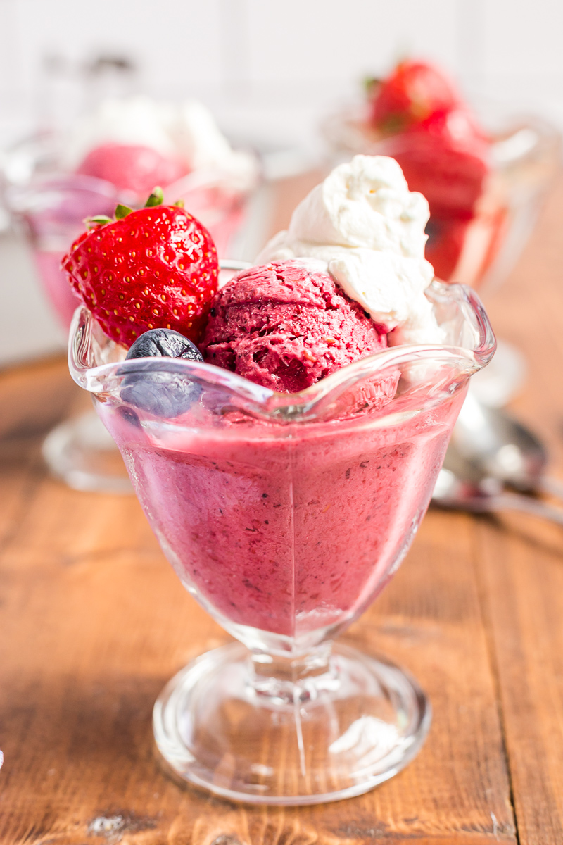 This 4 ingredient, no-churn, sugar-free mixed berry frozen yogurt recipe is keto-friendly, easy to make, and tastes delicious! #keto #lowcarb #sugarfree #nochurn #icecream #frozenyogurt #froyo #berry #dessert #easy #recipe | bobbiskozykitchen.com