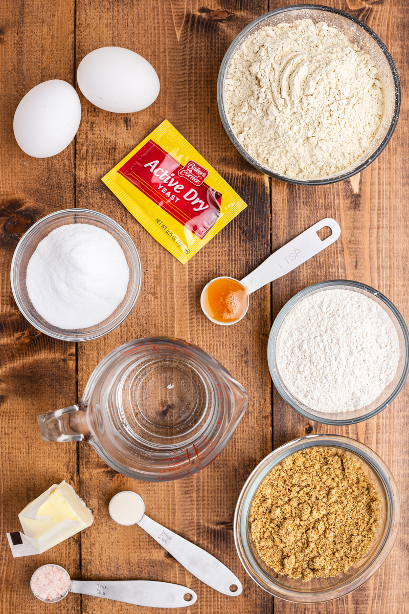 Overhead photo of the ingredients needed to make keto bread on a wooden table.