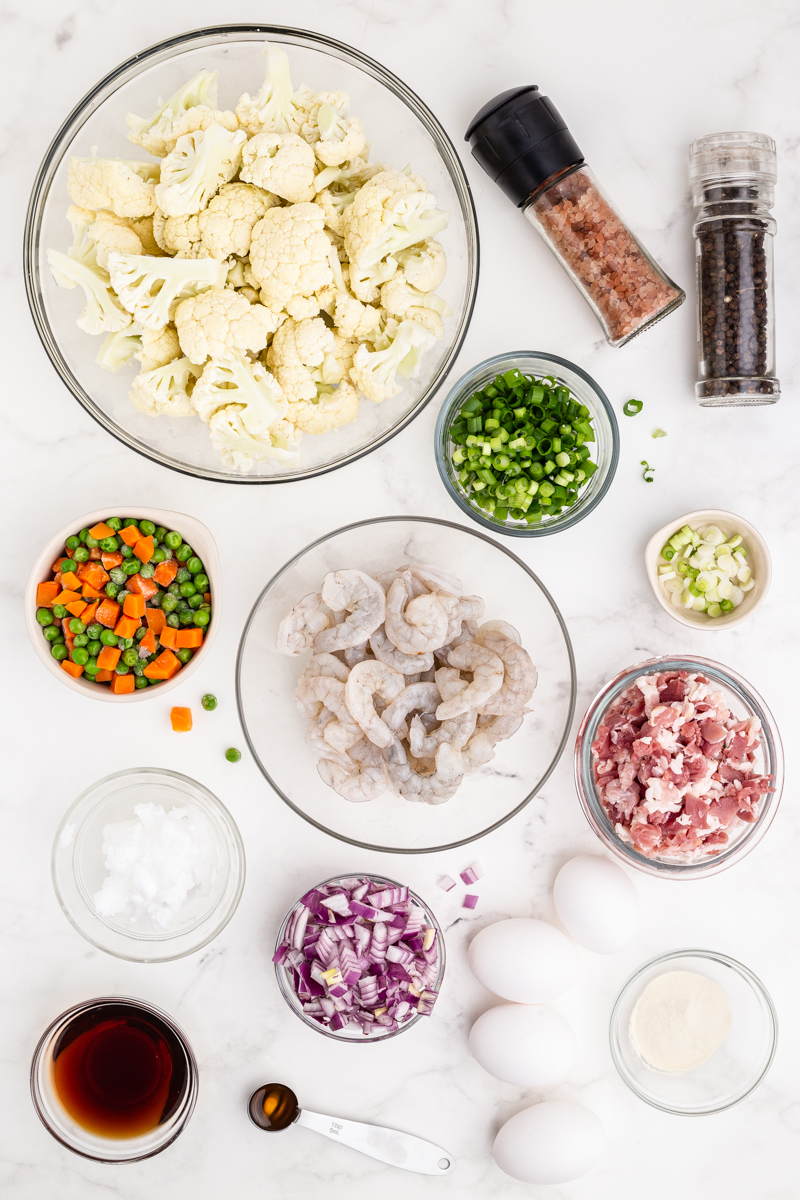 The ingredients needed to make Shrimp Fried Cauliflower Rice with Bacon.