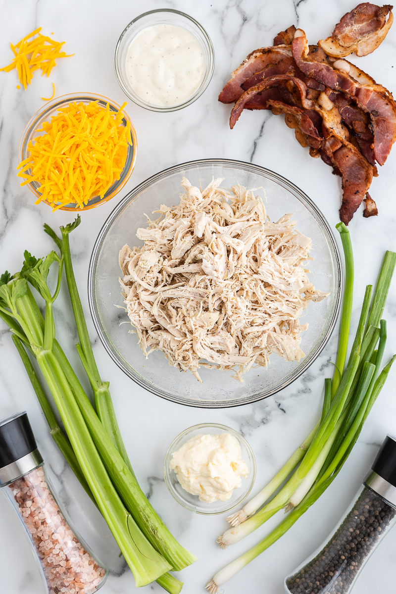 overhead photo of the ingredients needed to make Keto Bacon Ranch Chicken Salad.