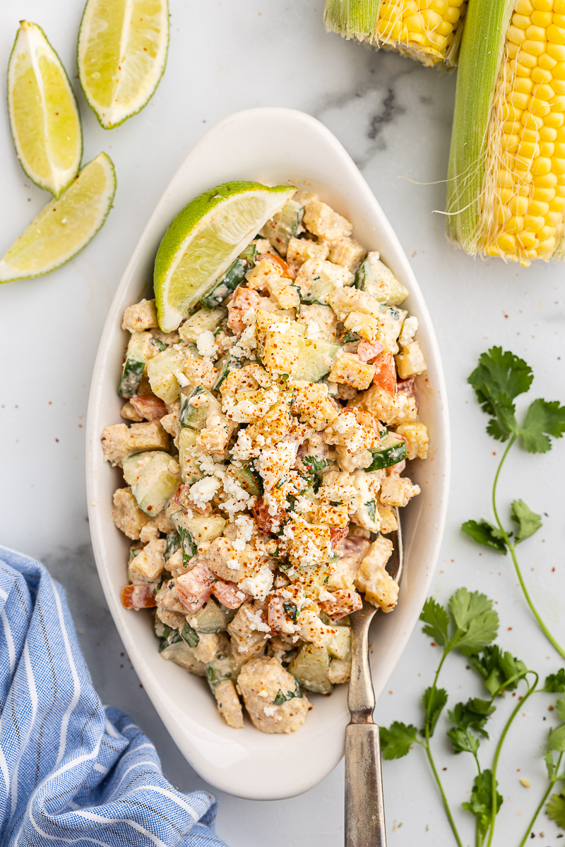 Low Carb Mexican Street Corn Salad in a white oval dish.