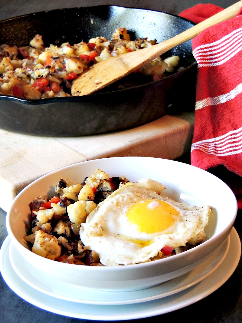 This Cauliflower Hash recipe is a delicious, low calorie, gluten-free, vegetarian or vegan, way to have that standard breakfast hash with zero guilt. #breakfast #cauliflower #potato #breakfast #glutenfree #vegetarian #vegan #recipe | bobbiskozykitchen.com