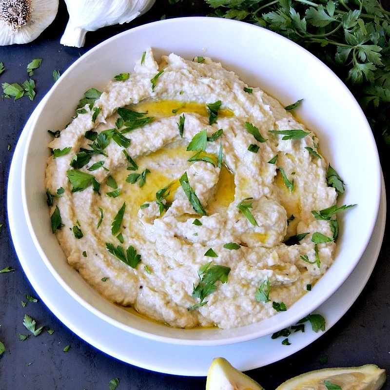 Creamy Artichoke and White Bean Dip - Switch up your normal hummus routine with this delicious artichoke and white bean dip. Eat it with pita chips, fresh veggies, or even on your sandwiches in place of the mayo. From www.bobbiskozykitchen.com