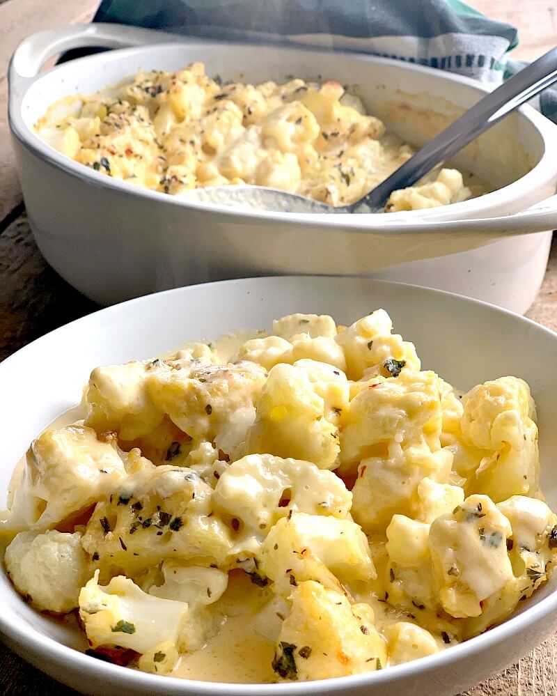 This keto-friendly Low Carb Cauliflower "Mac and Cheese" recipe is perfect when you are craving the comfort of mac and cheese, minus the pasta. Healthy and full of great things like veggies and protein, you get that cheesy goodness minus all of those carbs! #keto #ketodiet #lowcarb #lowcarbdiet #lchf #macandcheese #cauliflower #glutenfree #cheese #vegetarian #easy #recipe | bobbiskozykitchen.com