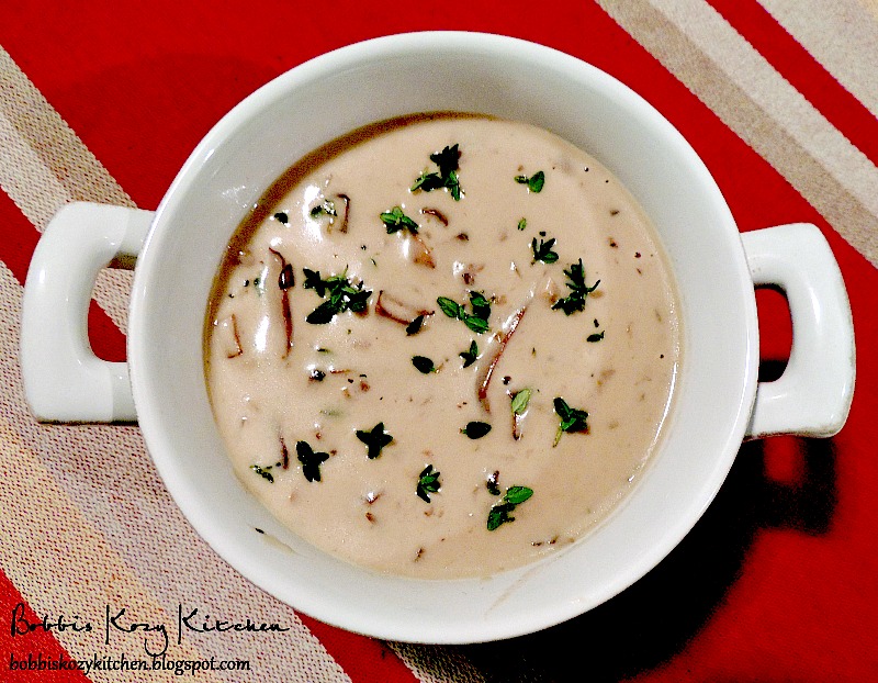 Cream of Mushroom Soup with Port Wine is rich and creamy, this mushroom soup will have you leaving those cans behind never to look back! From www.bobbiskozykitchen.com
