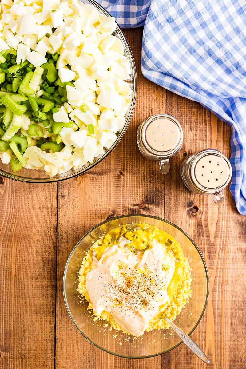 Deviled Egg Cauliflower Salad - This low carb, keto-friendly  Deviled Egg Cauliflower Salad recipe is easy to make and will quickly replace any potato salad recipe you have ever used! #keto #lowcarb #deviledegg #cauliflower #salad #potatosalad #sidedish | bobbiskozykitchen.com