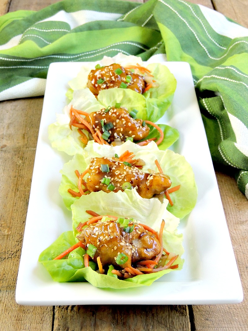 General Tso's Chicken Lettuce Wraps - Quick and easy to make, these lettuce wraps take appetizers to the next level by combining that classic Chinese entree with a favorite appetizer. The result is nothing short of delicious! #appetizer #Asian #chicken From www.bobbiskozykitchen.com