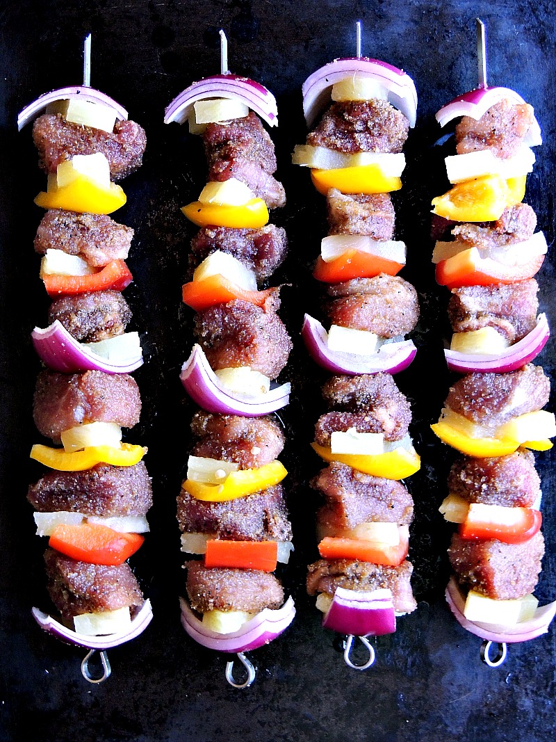 Quick and easy, these Hawaiian inspired pork kabobs are the perfect weeknight meal from www.bobbiskozykitchen.com