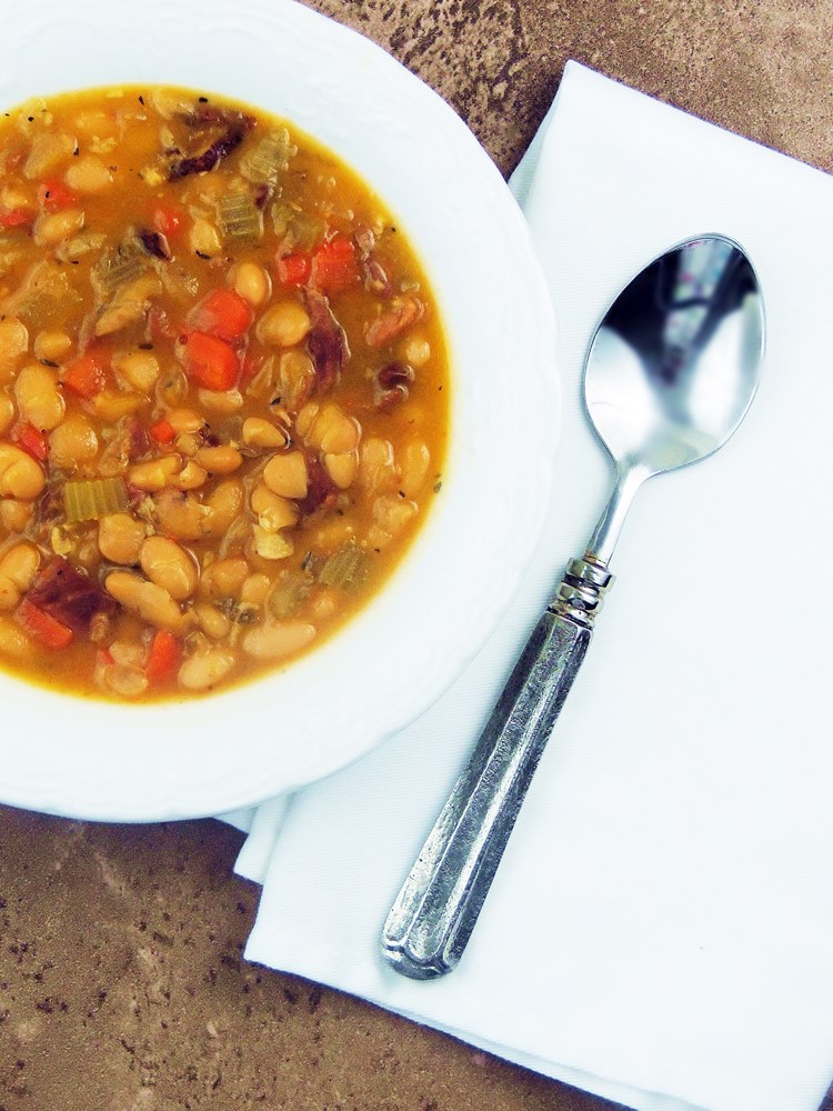 This Ham and Bean Soup recipe is so easy to make and is guaranteed to chase away those winter blues and warm you from head to toe! #ham #beans #soup #onepot #kidfriendly #easy #recipe | bobbiskozykitchen.com