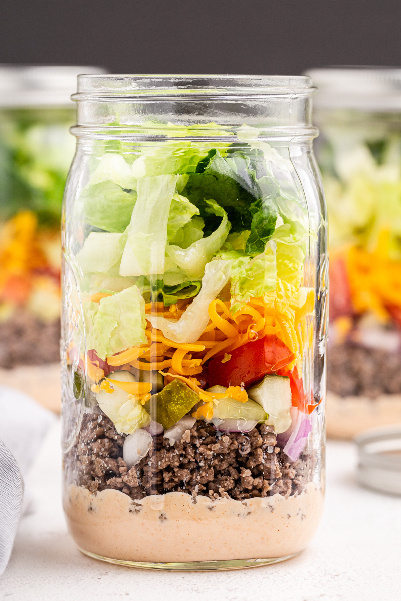 Close up photo of Big Mac Salad in a Jar.