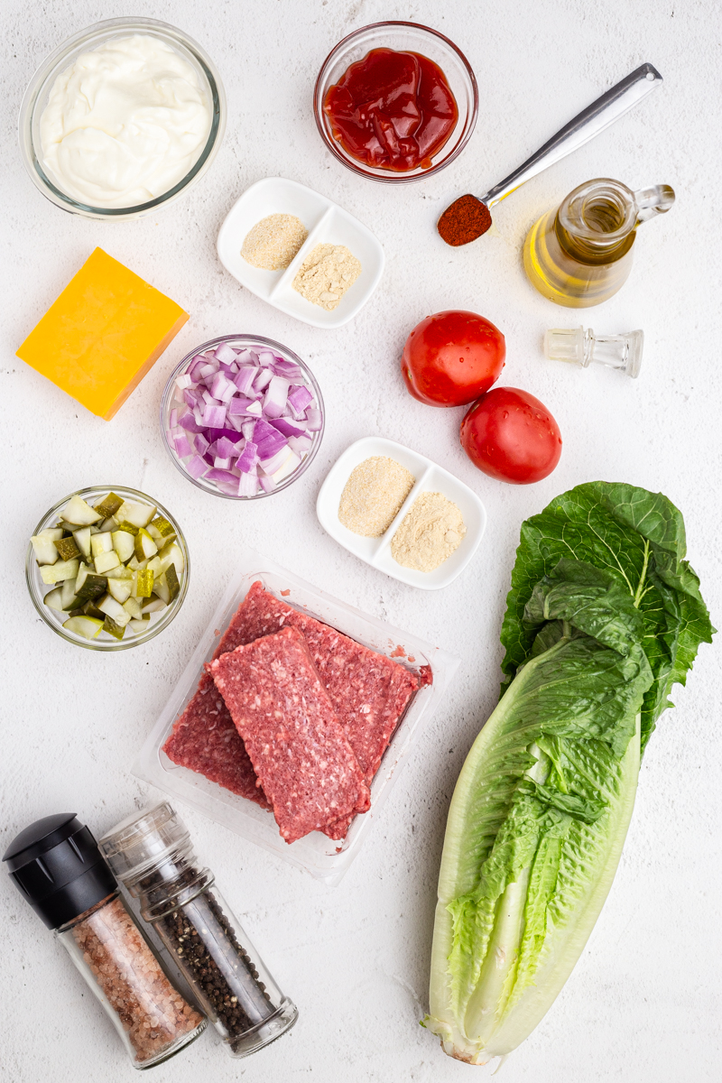 Overhead photo of the ingredients needed to make Big Mac Salad in a Jar.