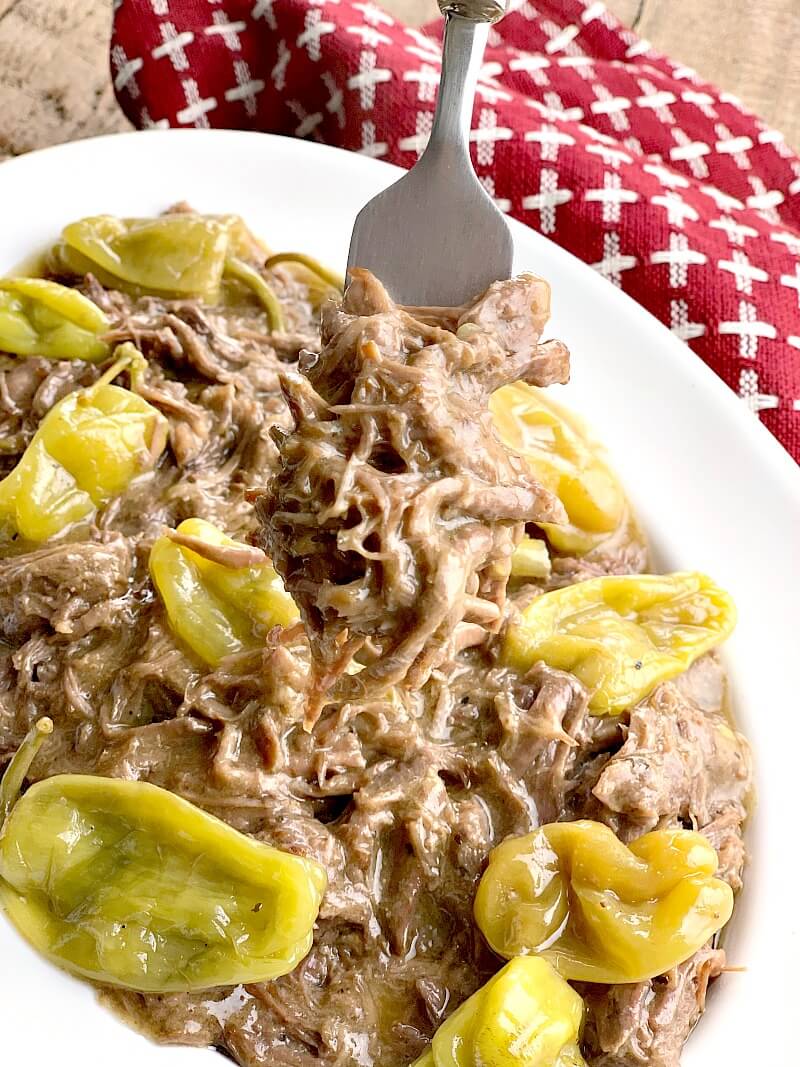 This Instant Pot Mississippi Pot Roast Recipe is low carb and keto-friendly. If you are looking for a fork-tender roast that is full of flavor and almost cooks itself, this is the roast recipe for you! #beef #instantpot #keto #lowcarb #lchf #easy #recipe | bobbiskozykitchen.com