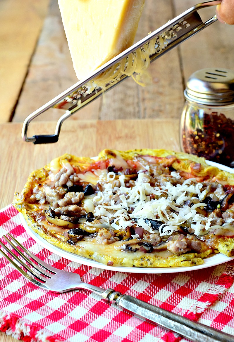 Keto Breakfast Pizza Breakfast doesn't have to be boring. Give yours an upgrade by making this delicious breakfast pizza. BONUS - it is LCHF/Keto friendly! #keto #glutenfree #lowcarb #LCHF #breakfast #pizza #recipe | bobbiskozykitchen.com