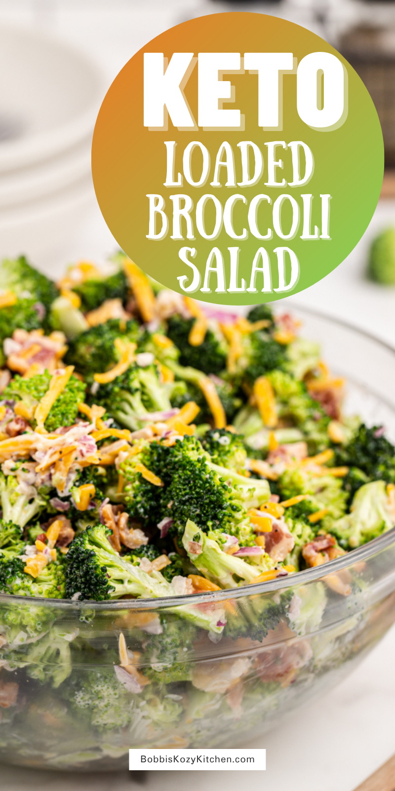 Loaded Broccoli Salad - This Loaded Broccoli Salad is the perfect low carb side dish. This delicious salad is filled with broccoli, bacon, red onion, cheese, and a homemade dressing your family will devour. #lowcarb #keto #broccoli #salad #bacon #cheese #onion