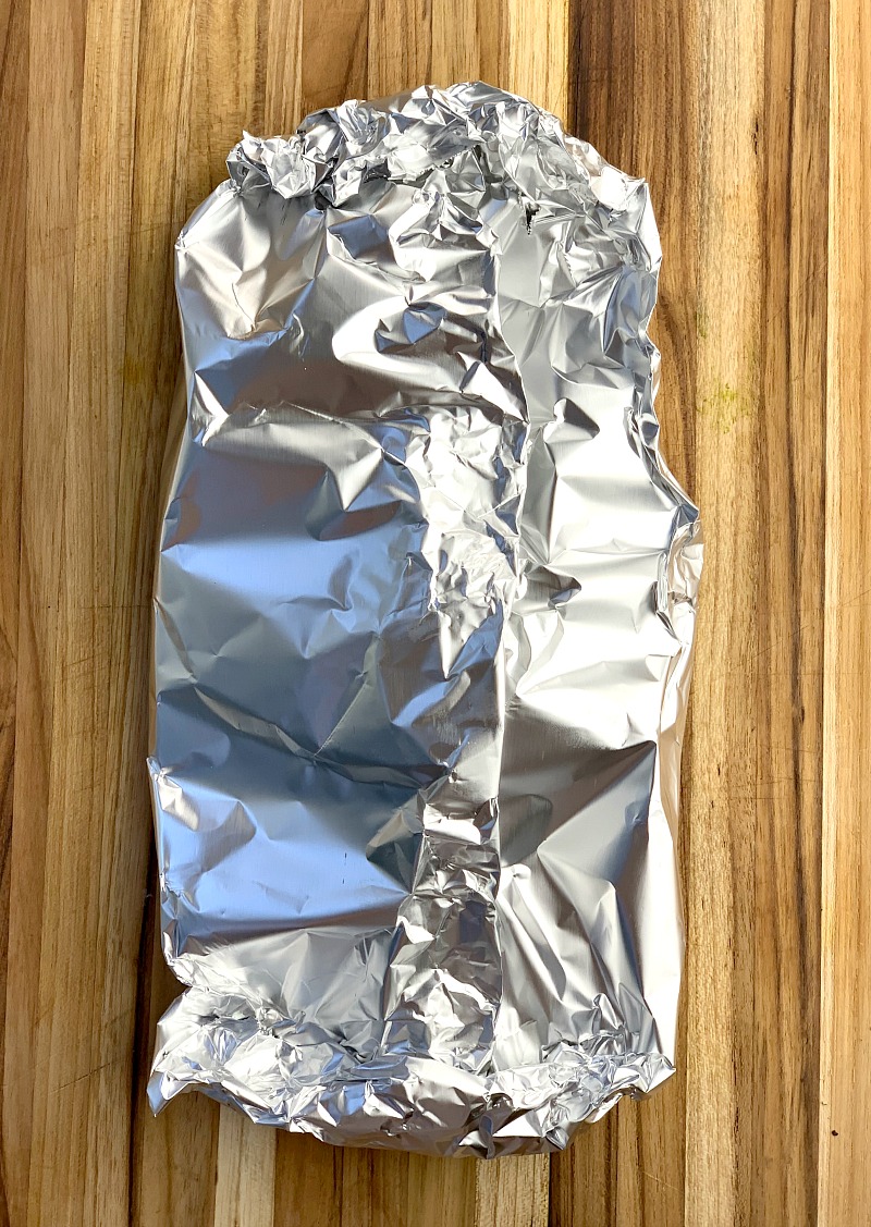 Lemon Garlic Salmon Foil Packs - Conquer your fear of grilling fish with this easy to make recipe for Lemon Garlic Salmon in foil. Delicious and easy to make with very little cleanup, it makes your summer grilling a breeze and will have the family begging for more! #keto #lowcarb #glutenfree #grilling #grilled #salmon #fish #seafood #lemon #garlic #easy #recipe | bobbiskozykitchen.com