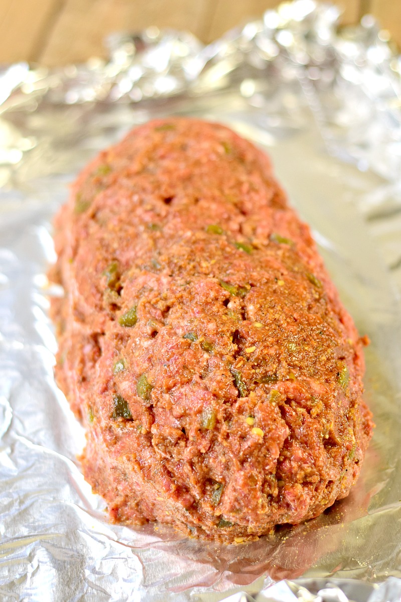 Change up your Taco Tuesday with this amazing Low-Carb Taco Meatloaf recipe. Your family will love it and you will never miss those pesky carbs! #keto #lowcarb #lchf #meatloaf #Mexican #easy #recipe | bobbiskozykitchen.com