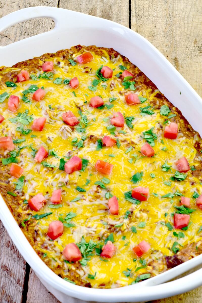 Low-Carb Texas Trash Dip - The wildly popular Texas Trash Dip gets an update in this low carb version. All of the flavor, thanks to Mexican spices and chopped roasted green chiles, with a creamy, cheesy, chili mix, makes for a delicious dip for your next party or game day that is a definite crowd pleaser! #appetizer #dip #Texas #cheese #easy #recipe #lowcarb #keto | bobbiskozykitchen.com