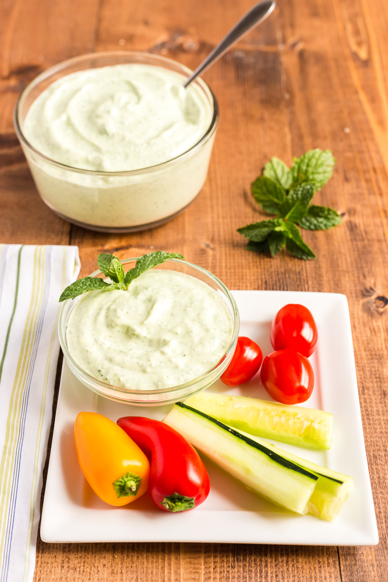 This traditional mint raita recipe can be made with, or without, the chile pepper. The yogurt and mint act as a cooling agent to help balance any spicy food. #sauce #indian #raita #yogurt #condiment #traditional #lowcarb #keto #easy #recipe | bobbiskozykitchen.com