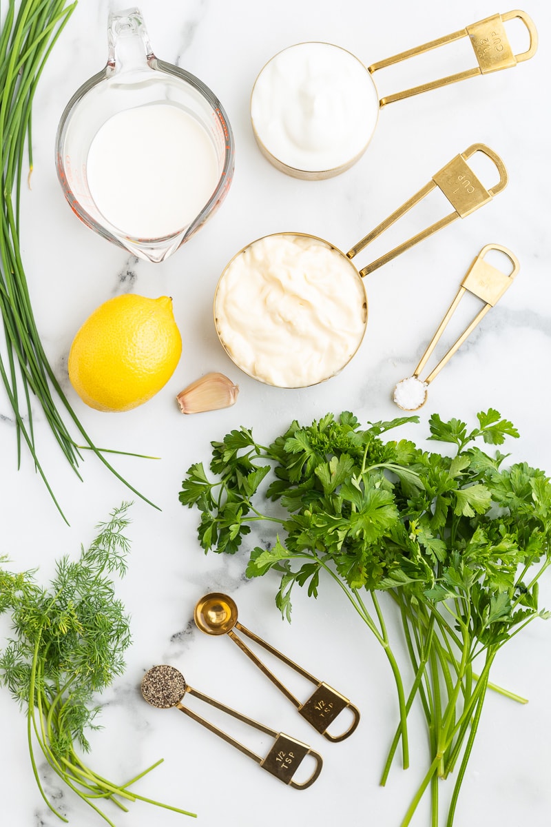 The ingredients needed to make homemade keto ranch dressing.