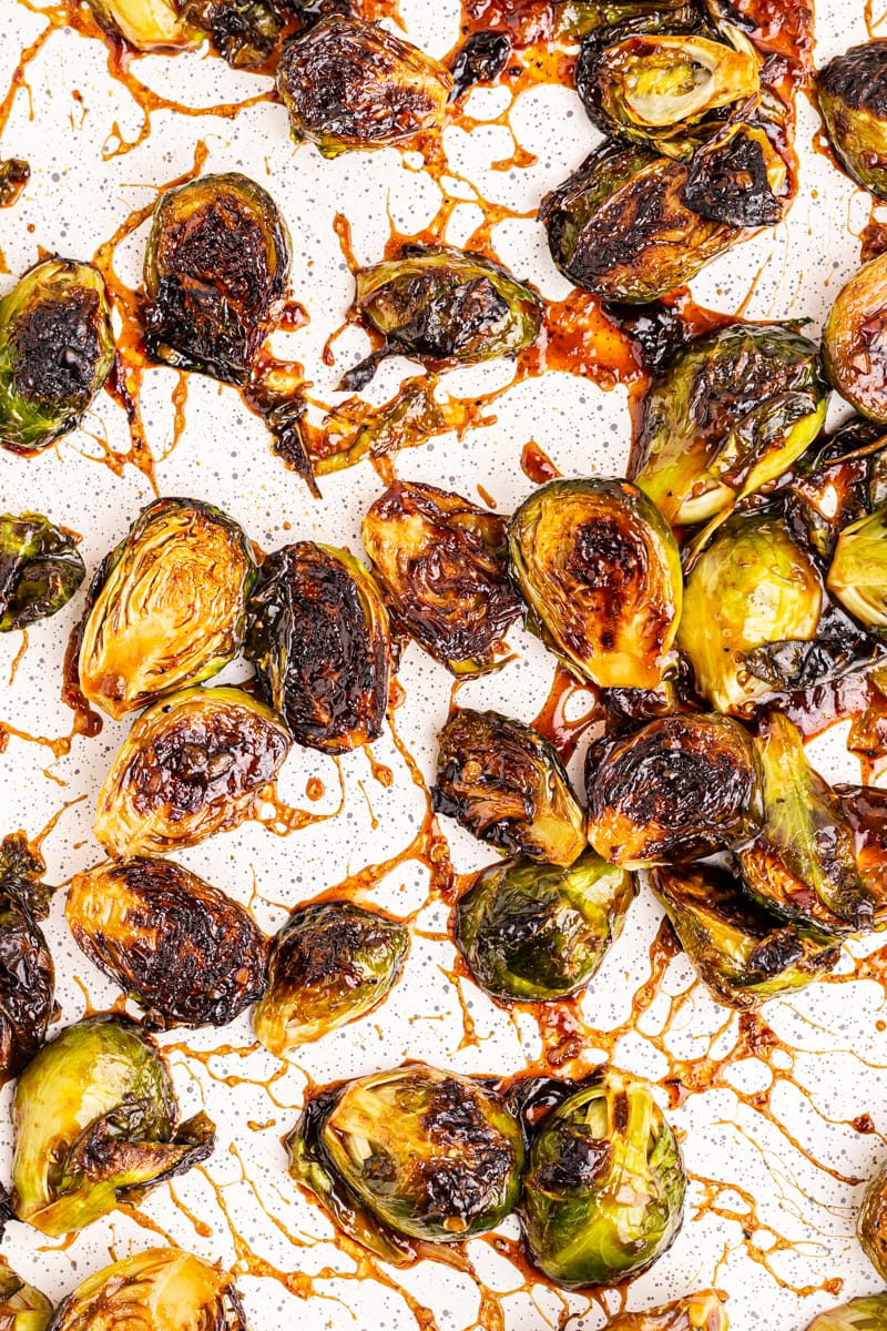 Kung pao brussels sprouts on a baking sheet.