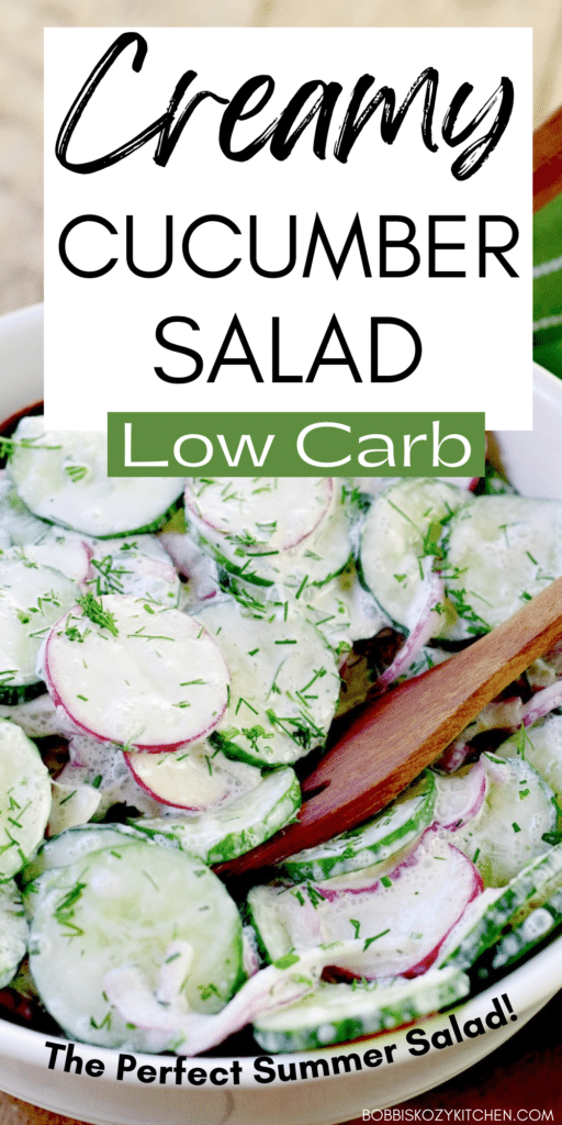 A pinterest graphic with the image of creamy low carb cucumber salad in a white salad bowl with wooden tongs on it.