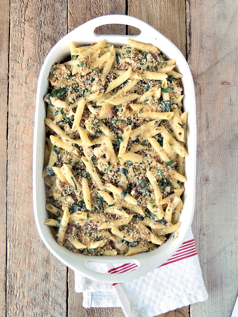 Overhead view of the completed casserole sitting on a wooden table.